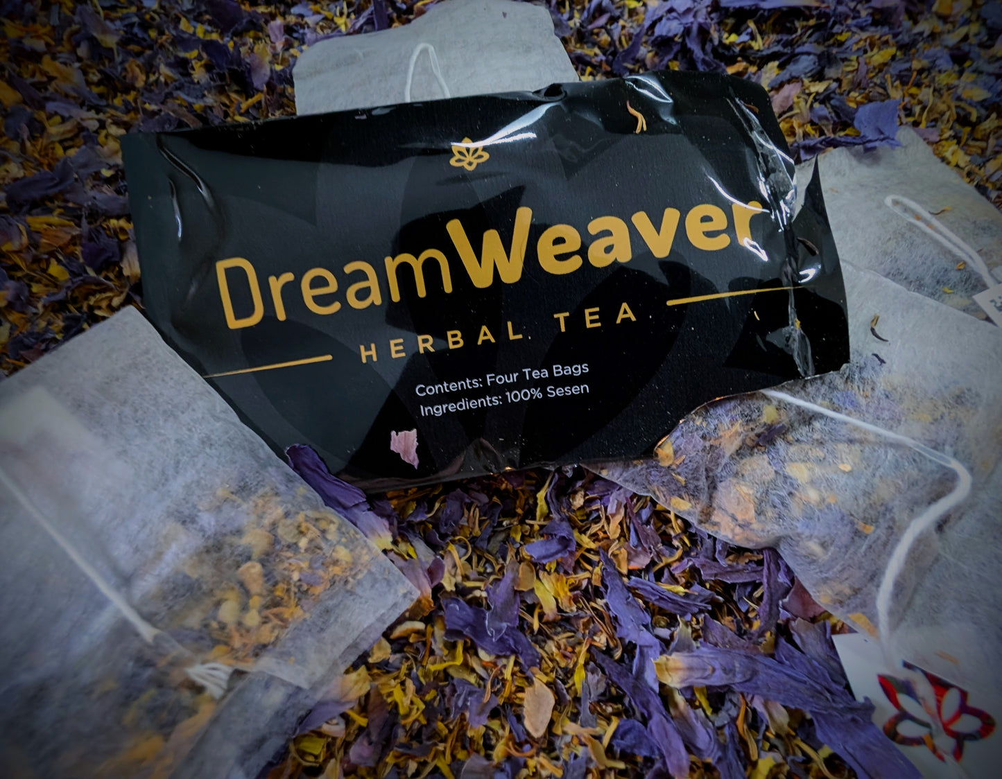 Dream Weaver herbal tea packaging with tea bags on a floral background